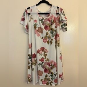 Floral dress swing dress with cold shoulder detail and pockets. Size L